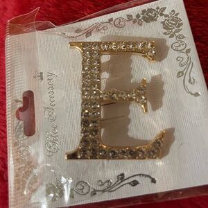 Elegant rhinestone letter “E” brooch Goldtone